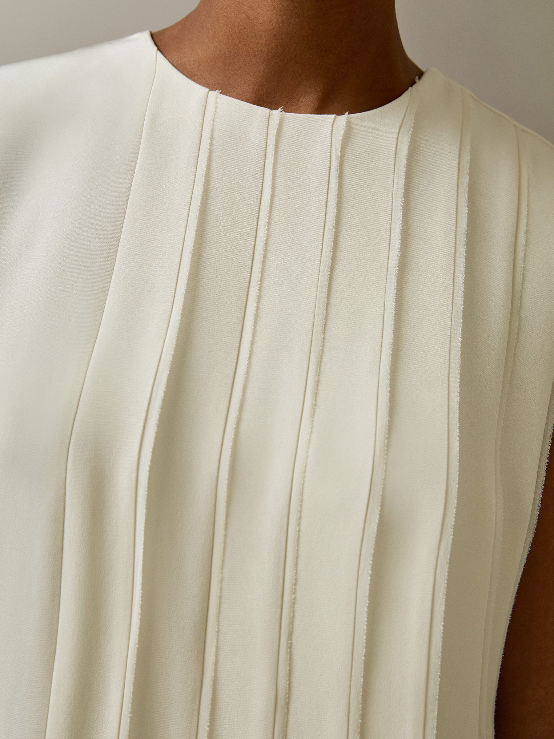 Sleeveless accordion pleated silk dress