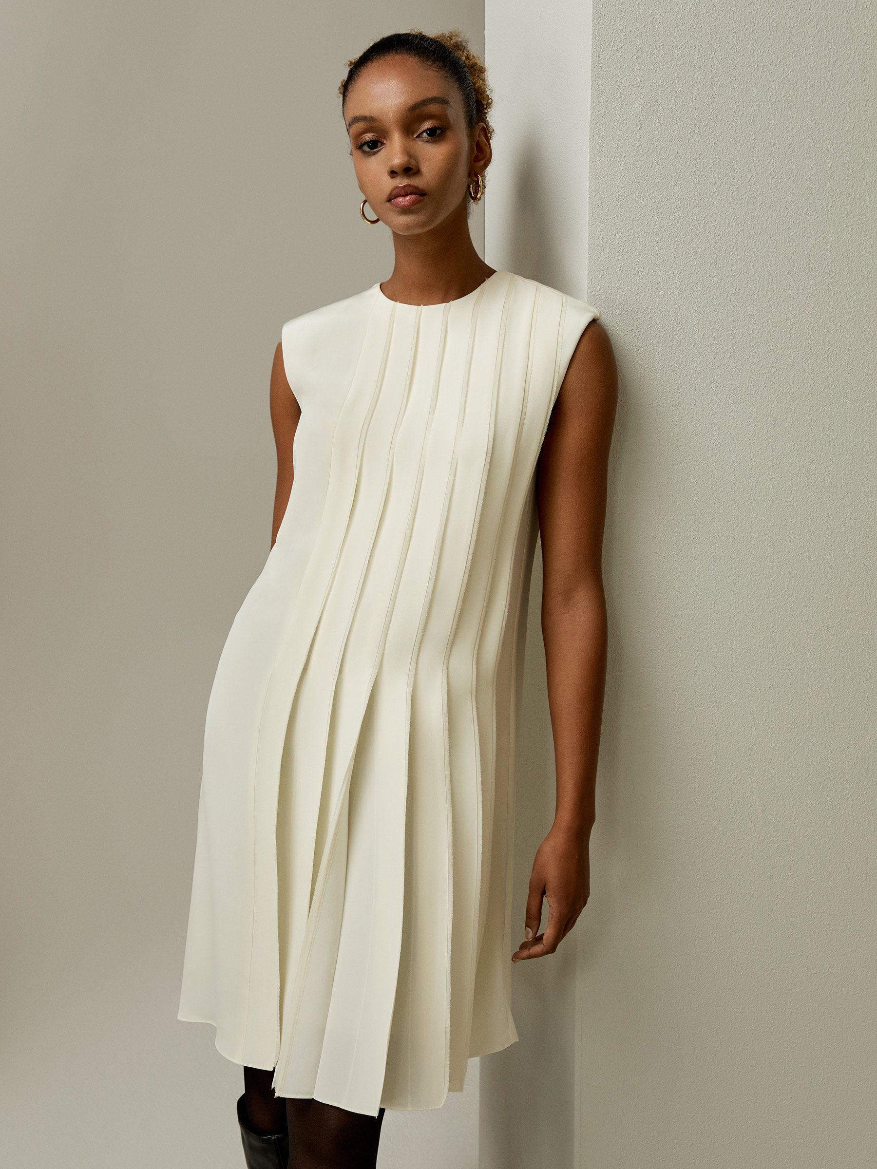 Sleeveless accordion pleated silk dress