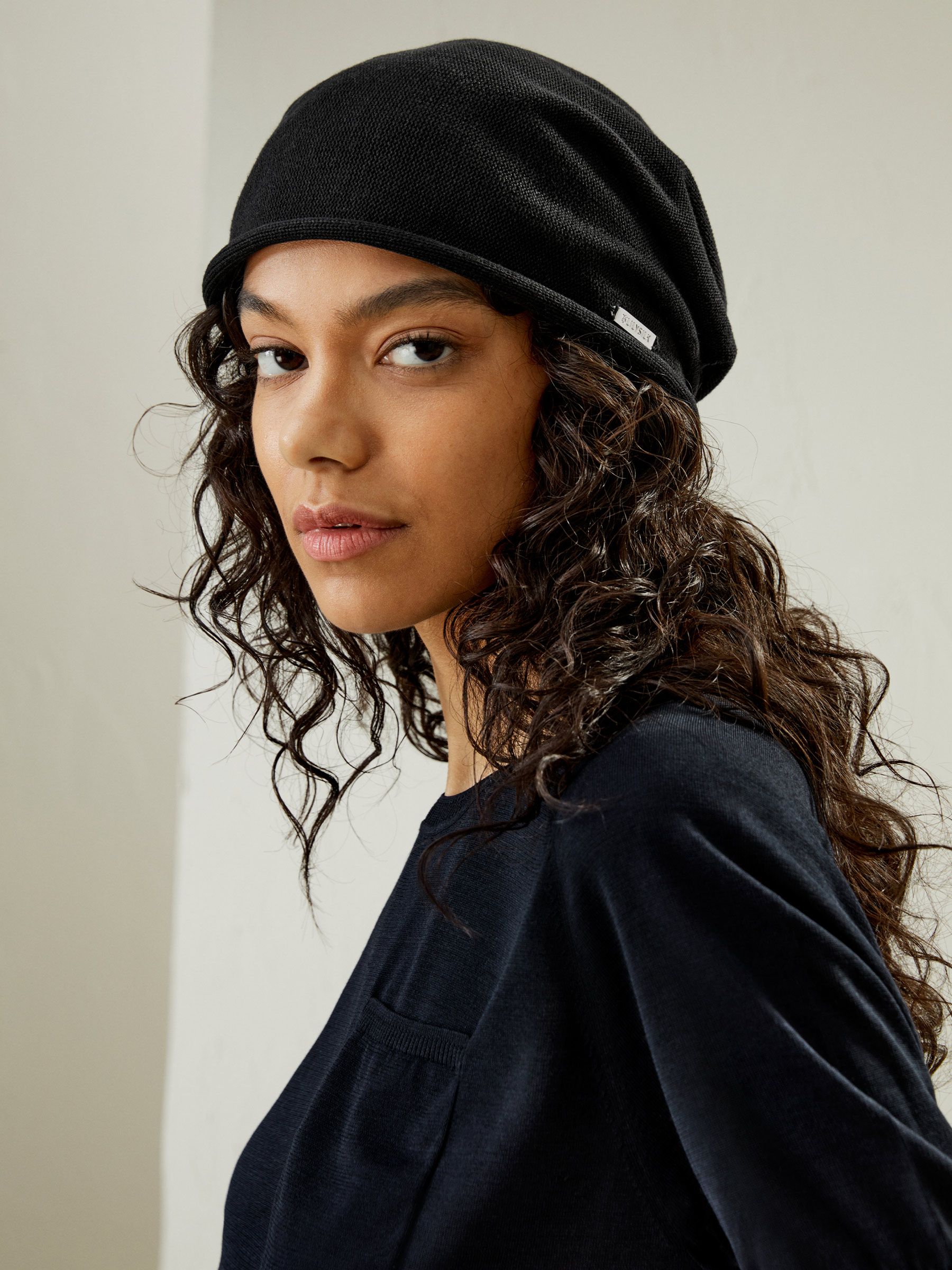 Versatile Metal Logo Silk Beanie